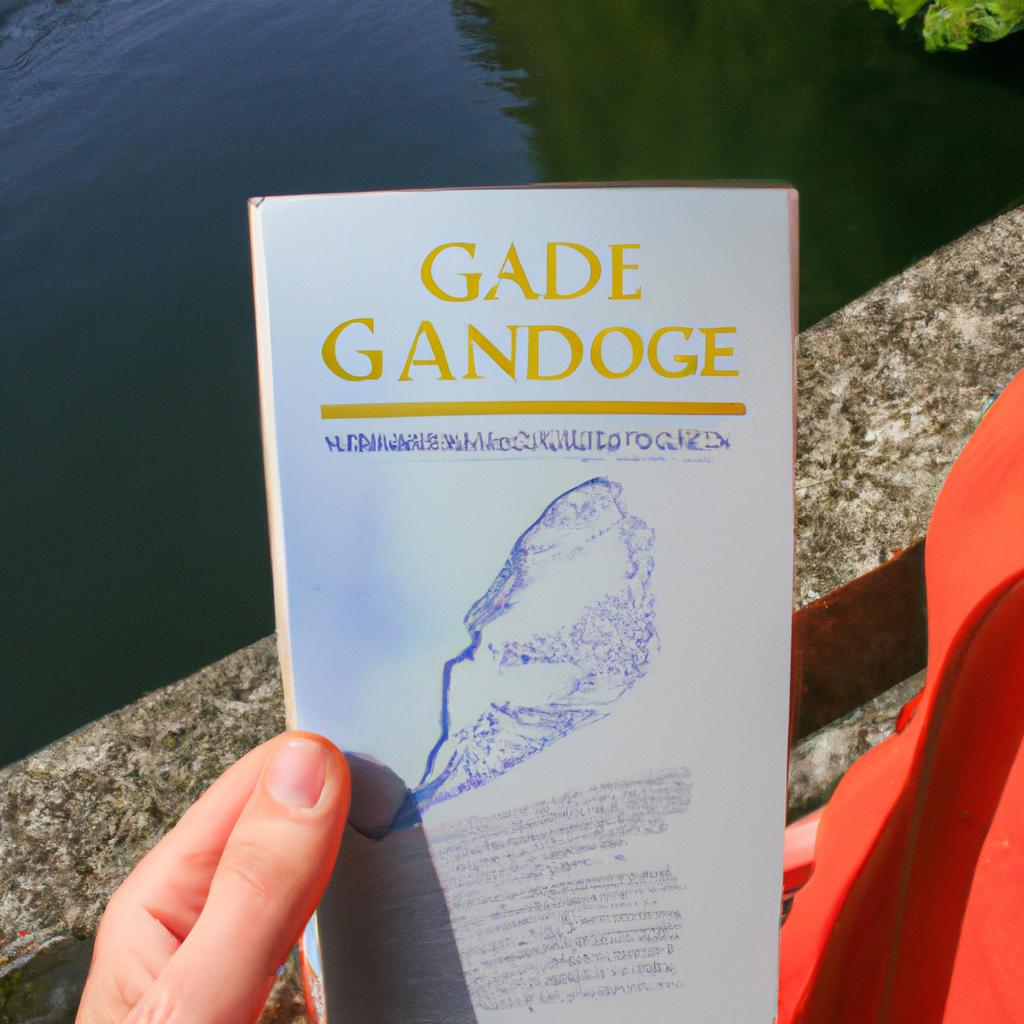 Person holding a guidebook